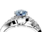 Halo Engagement Ring Setting for Fancy Blue Pear-Shaped Center with Marquise and Pave Bypass Band and Prong Head in White Gold