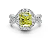 Halo Engagement Ring Setting for Fancy Yellow Radiant Cut Center with Pave Infinity Twist Band and Prong Head in White Gold