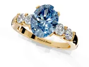5 Stone Engagement Ring Setting for Fancy Blue Oval Center with Plain Band and Prong Head in Yellow Gold