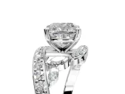 Solitaire Engagement Ring Setting for Cushion Cut Center with Pave Bypass Twist Band and Prong Head in White Gold