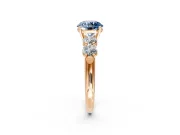 5 Stone Engagement Ring Setting for Fancy Blue Round Cut Center with Graduated Accents and Prong Head in Rose Gold