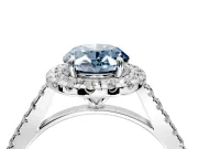 Halo Engagement Ring Setting for Fancy Blue Oval Center with Narrowing Pave Band and Prong Head in White Gold