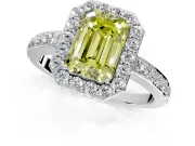 Halo Engagement Ring Setting for Fancy Yellow Emerald Cut Center with Heart-Shaped Openwork, Pave Band and Prong Head in Platinum