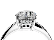 Solitaire Engagement Ring Setting for Round Cut Center with Channel-Set Accent Band and Prong Head in White Gold