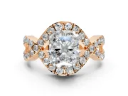 Halo Engagement Ring Setting for Radiant Cut Center with Pave Infinity Twist Band and Prong Head in Rose Gold