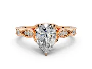 Solitaire Engagement Ring Setting for Pear-Shaped Center with Marquise and Bezel Accents and Prong Head in Rose Gold