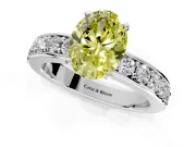 Solitaire Engagement Ring Setting for Fancy Yellow Oval Center with Channel-Set Accents and Prong Head in Platinum