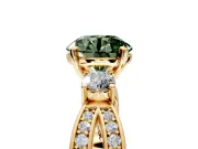 3 Stone Engagement Ring Setting for Fancy Green Round Cut Center with Pave Twist Band and Prong Head in Yellow Gold