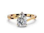 Solitaire Engagement Ring Setting for Pear-Shaped Center with Plain Bypass Twist Band and Prong Head in Yellow Gold