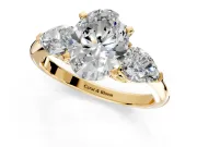 3 Stone Engagement Ring Setting for Oval Center with Large Pear-Shaped Accents and Prong Head in Yellow Gold