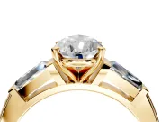 3 Stone Engagement Ring Setting for Pear-Shaped Center with Tapered Baguettes, Plain Band and Prong Head in Yellow Gold