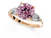 3 Stone Engagement Ring Setting for Fancy Pink Round Cut Center with Large Pear-Shaped Accents and Prong Head in Rose Gold