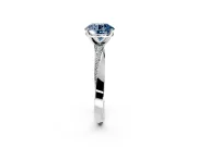 Side Accent Engagement Ring Setting for Fancy Blue Round Cut Center with Accent Shoulders and Prong Head in Platinum