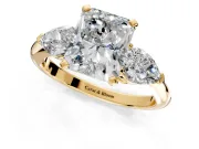 3 Stone Engagement Ring Setting for Radiant Cut Center with Large Pear-Shaped Accents and Prong Head in Yellow Gold
