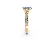 Cluster Engagement Ring Setting for Fancy Blue Pear-Shaped Center with Bezel Accent Clusters and Prong Head in Yellow Gold