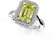 Halo Engagement Ring Setting for Fancy Yellow Emerald Cut Center with Twist Band and Prong Head in White Gold