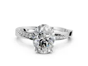 Side Accent Engagement Ring Setting for Oval Center with Accent Shoulders and Prong Head in Platinum