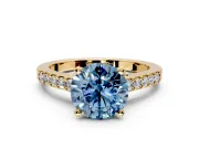 Solitaire Engagement Ring Setting for Fancy Blue Round Cut Center with Crossover Accents and Prong Head in Yellow Gold