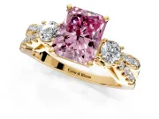 3 Stone Engagement Ring Setting for Fancy Pink Radiant Cut Center with Pave Split Shank and Prong Head in Yellow Gold