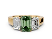 3 Stone Engagement Ring Setting for Fancy Green Emerald Cut Center with Raised Basket Heads and Prong Head in Yellow Gold
