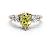 3 Stone Engagement Ring Setting for Fancy Yellow Pear-Shaped Center with Large Pear-Shaped Accents and Prong Head in Rose Gold