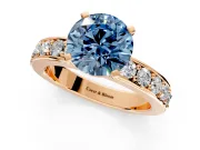 Solitaire Engagement Ring Setting for Fancy Blue Round Cut Center with Channel-Set Accents and Prong Head in Rose Gold