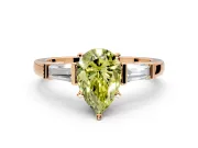 3 Stone Engagement Ring Setting for Fancy Yellow Pear-Shaped Center with Channel Baguette Accents and Prong Head in Rose Gold