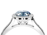 Halo Engagement Ring Setting for Fancy Blue Oval Center with Pave Accents, Heart Basket and Prong Head in Platinum