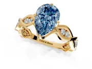 Solitaire Engagement Ring Setting for Fancy Blue Pear-Shaped Center with Accented Twist Band and Leaf Prong Head in Yellow Gold