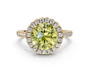 Halo Engagement Ring Setting for Fancy Yellow Round Cut Center with Narrowing Pave Band and Prong Head in Yellow Gold