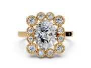 Cluster Halo Engagement Ring Setting for Oval Center with Milgrain Bezel Accents and Prong Head in Yellow Gold