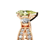 3 Stone Engagement Ring Setting for Fancy Yellow Pear-Shaped Center with Pave Twist Band and Prong Head in Rose Gold