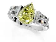 Channel-Set Engagement Ring Setting for Fancy Yellow Pear-Shaped Center with Baguette Band and Prong Head in Sterling Silver