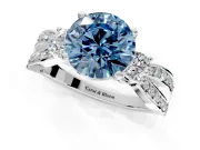 3 Stone Engagement Ring Setting for Fancy Blue Round Cut Center with Pave Twist Band and Prong Head in Platinum
