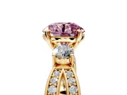 3 Stone Engagement Ring Setting for Fancy Pink Round Cut Center with Pave Twist Band and Prong Head in Yellow Gold