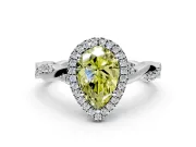Halo Engagement Ring Setting for Fancy Yellow Pear-Shaped Center with Pave and Plain Twist Band and Prong Head in Platinum