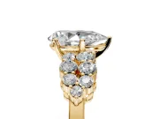 Cluster Engagement Ring Setting for Pear-Shaped Center with 2-Row Shoulder Clusters and Prong Head in Yellow Gold