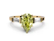 3 Stone Engagement Ring Setting for Fancy Yellow Pear-Shaped Center with Channel Baguette Accents and Prong Head in Yellow Gold
