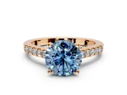 Solitaire Engagement Ring Setting for Fancy Blue Round Cut Center with Crossover Accents and Prong Head in Rose Gold