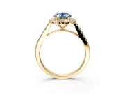 Halo Engagement Ring Setting for Fancy Blue Oval Center with Narrowing Pave Band and Prong Head in Yellow Gold