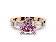 3 Stone Engagement Ring Setting for Fancy Pink Heart-Shaped Center with Channel Baguette Accents and Prong Head in Rose Gold