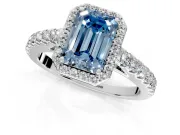 Halo Engagement Ring Setting for Fancy Blue Emerald Cut Center with Full Pave Band and Prong Head in Platinum