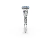 Channel-Set Engagement Ring Setting for Fancy Blue Radiant Cut Center with Baguette Band and Prong Head in Platinum