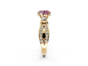 3 Stone Engagement Ring Setting for Fancy Pink Round Cut Center with Pave Twist Band and Prong Head in Yellow Gold