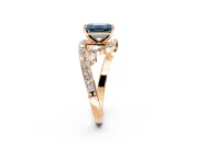 Solitaire Engagement Ring Setting for Fancy Blue Emerald Cut Center with Pave Bypass Twist Band and Prong Head in Rose Gold