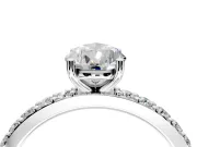 Solitaire Engagement Ring Setting for Pear-Shaped Center with Round Cut Pave Band and Prong Head in Platinum