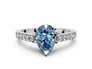 Solitaire Engagement Ring Setting for Fancy Blue Pear-Shaped Center with Crossover Accents and Prong Head in Platinum