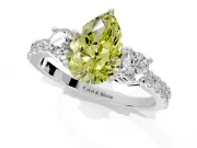 3 Stone Engagement Ring Setting for Fancy Yellow Pear-Shaped Center with Round Cut Side Accents and Prong Head in Platinum