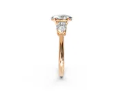 3 Stone Engagement Ring Setting for Oval Center with Large Pear-Shaped Accents and Prong Head in Rose Gold
