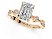Solitaire Engagement Ring Setting for Emerald Cut Center with Milgrain Bezel Accents and Prong Head in Rose Gold